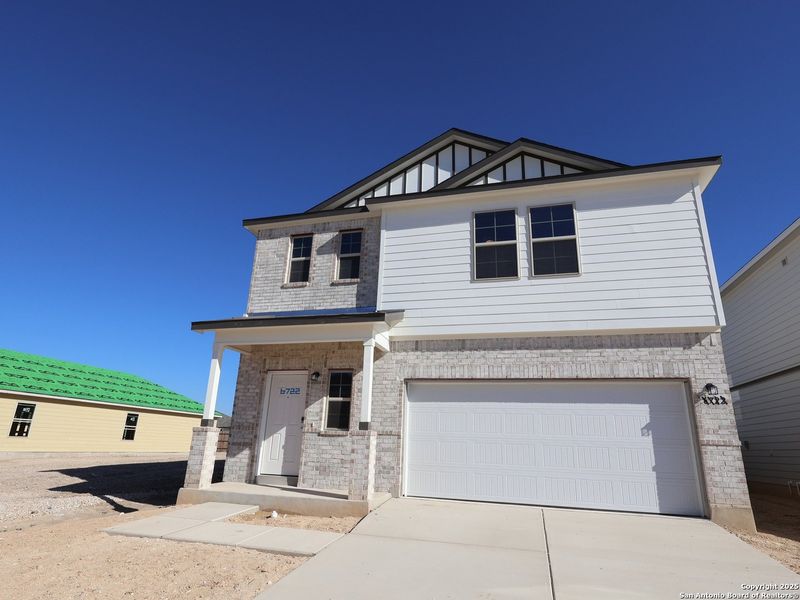 Front exterior of a new home in Winding Brook, San Antonio, TX, highlighting curb appeal (Image 2). Front exterior of a new home in Winding Brook, San Antonio, TX, highlighting curb appeal (Image 2).