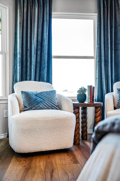 Primary bedroom in the model home located in Carillon at 13305 Eppright Trace Blvd., Manor, TX Primary bedroom in the model home located in Carillon at 13305 Eppright Trace Blvd., Manor, TX