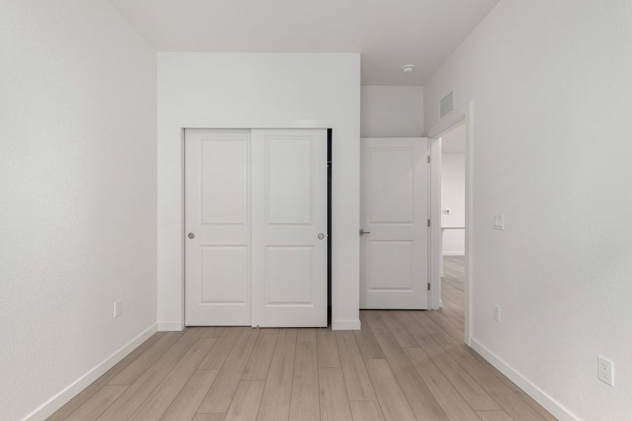 Spacious, unfurnished interior of a new home in Gateway Commons, Denver (Image 22).