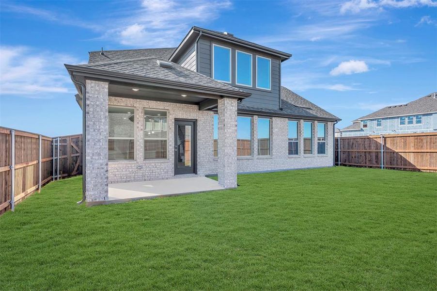Exterior details and patio area of a home in Lily Creek at Sutton Fields, Aubrey (Image 2). Exterior details and patio area of a home in Lily Creek at Sutton Fields, Aubrey (Image 2).