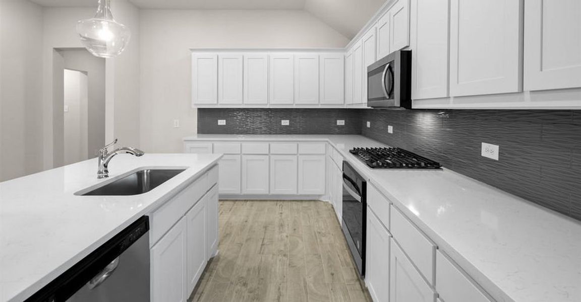 Representative exterior photo of a completed home built from the Salinas by Impression Homes in Redden Farms, Midlothian, TX (Image 8). Representative exterior photo of a completed home built from the Salinas by Impression Homes in Redden Farms, Midlothian, TX (Image 8).