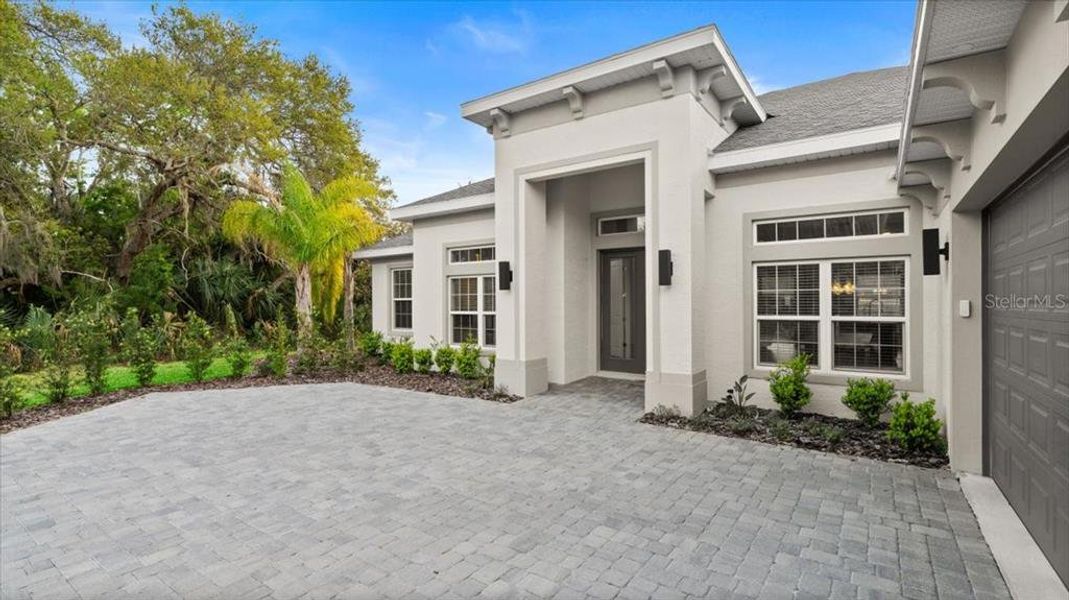 Front exterior of a new home in , Palm Coast, FL, highlighting curb appeal (Image 22).