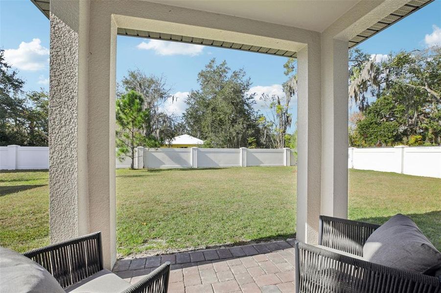 Exterior details and patio area of a home in Fox Pointe at Rivers Edge, Leesburg (Image 3).