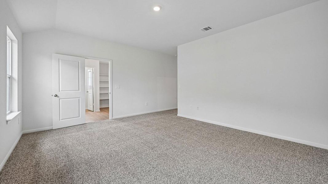 Spacious, unfurnished interior of a new home in Bar W Ranch, Leander (Image 34).