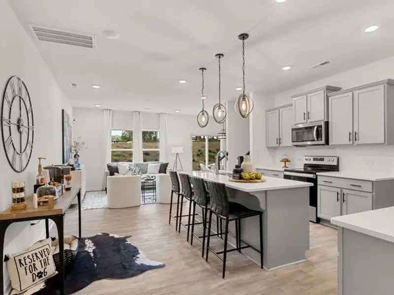 Representative furnished interior of a home built from the Haven TH by True Homes in Village Heights TH, Greensboro (Image 3).