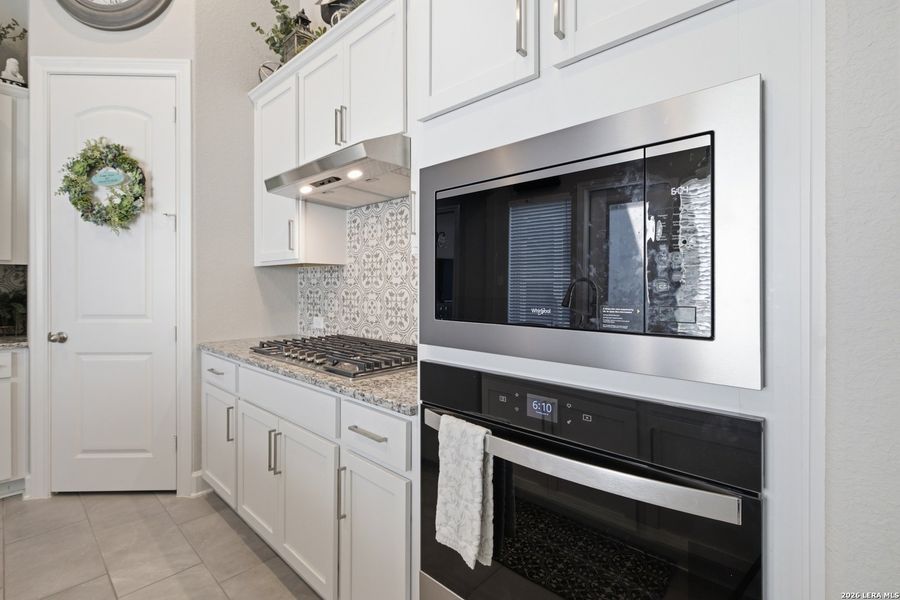 Furnished interior view inside a new home in Ventana, Bulverde (Image 49).