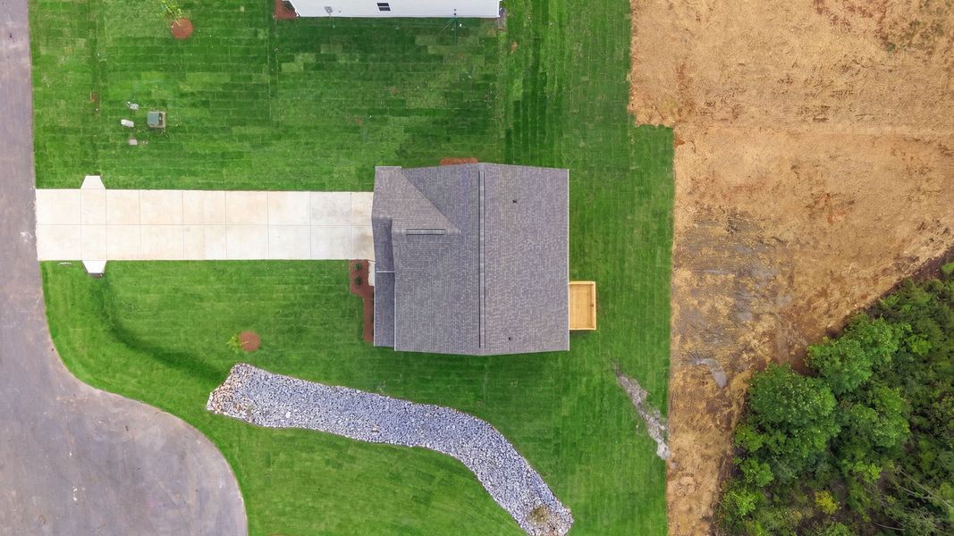 Exterior details and patio area of a home in Beaver Dam Crossing, Bailey (Image 20).