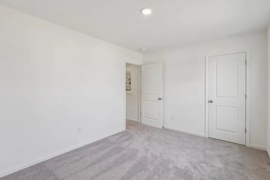 A room with white doors. A room with white doors.