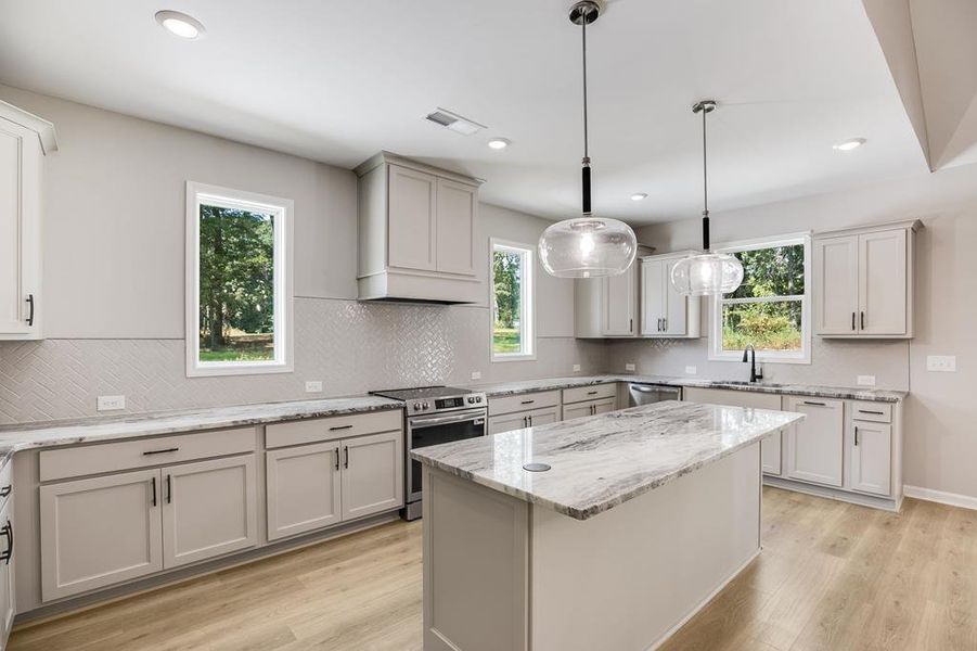 Furnished interior view inside a new home in LOVVORN ESTATES, Carrollton (Image 6).
