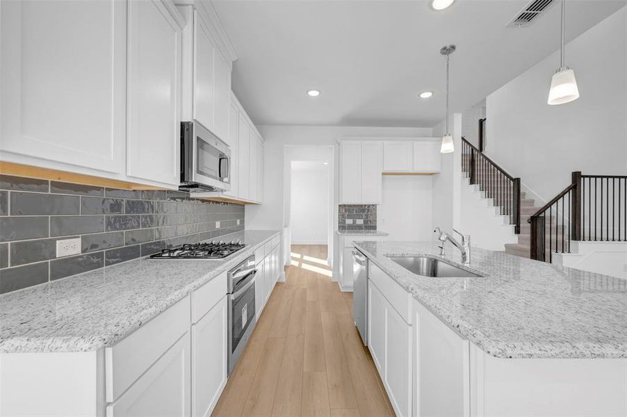 Furnished interior view inside a new home in Lily Creek at Sutton Fields, Aubrey (Image 11). Furnished interior view inside a new home in Lily Creek at Sutton Fields, Aubrey (Image 11).