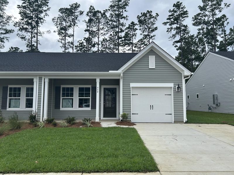 Front exterior of a new home in Hammock Walk at Nexton, Summerville, SC, highlighting curb appeal (Image 2). Front exterior of a new home in Hammock Walk at Nexton, Summerville, SC, highlighting curb appeal (Image 2).