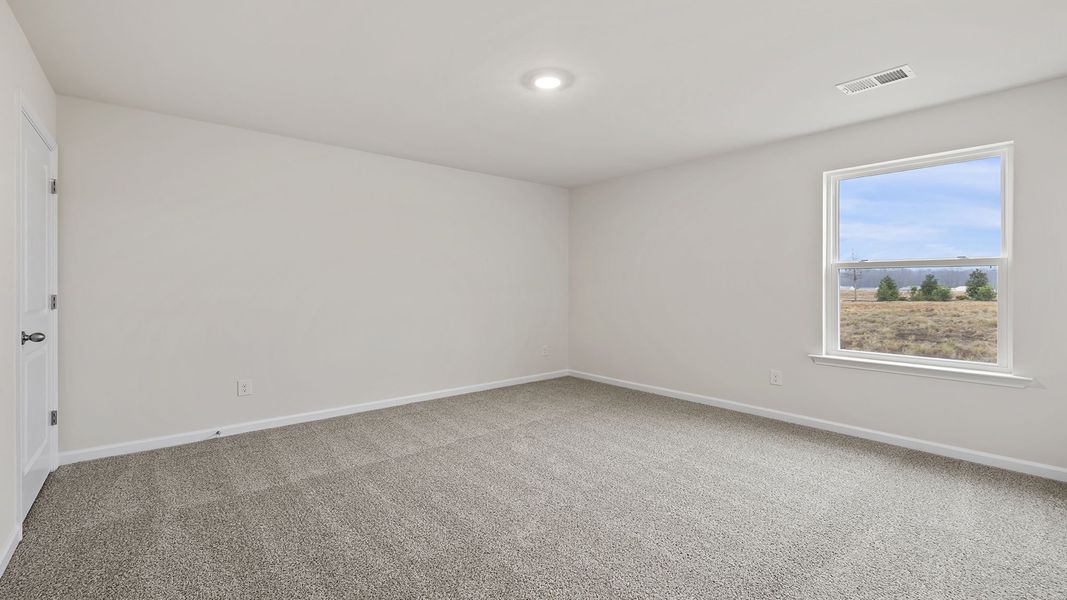 Spacious, unfurnished interior of a new home in Bentley Park, Greenwood (Image 22).
