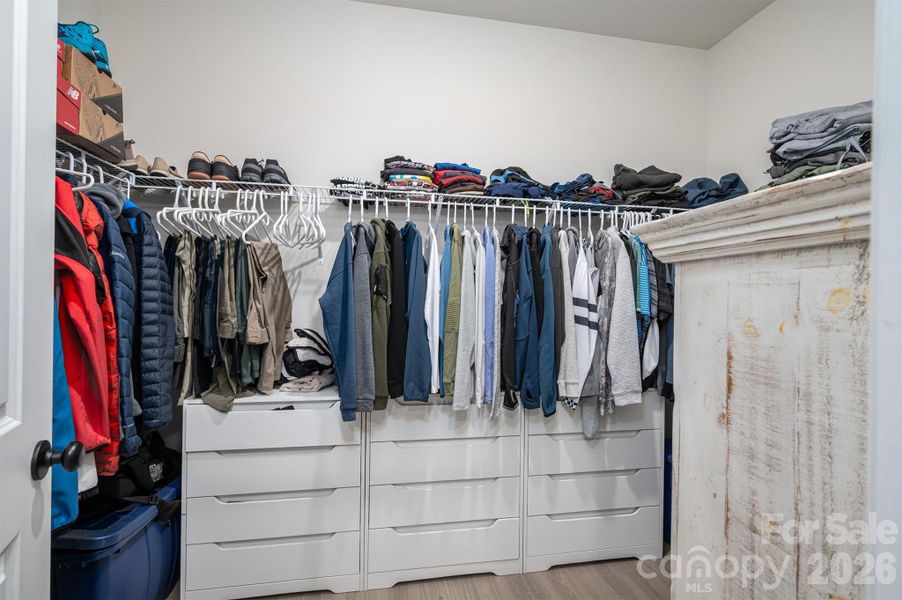 Primary Walk-in closet off of bathroom