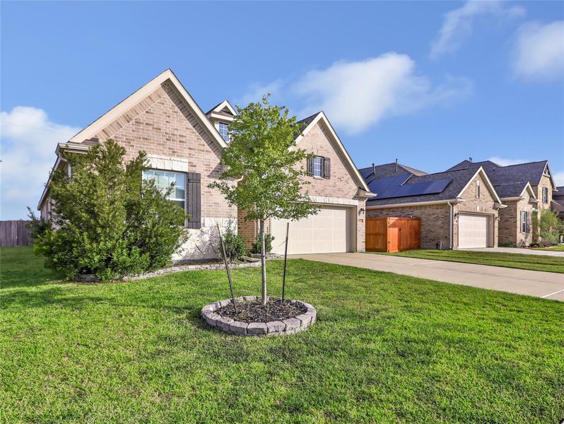 Front exterior of a new home in , Baytown, TX, highlighting curb appeal (Image 1). Front exterior of a new home in , Baytown, TX, highlighting curb appeal (Image 1).