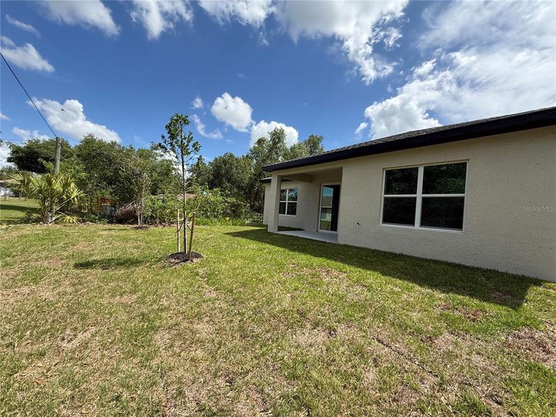 Exterior details and patio area of a home in , Port Charlotte (Image 18).