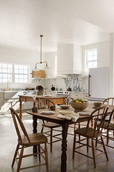 Dining room featuring finished concrete floors