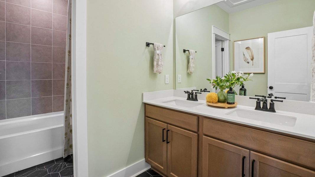 Secondary bathroom with dual vanity Secondary bathroom with dual vanity