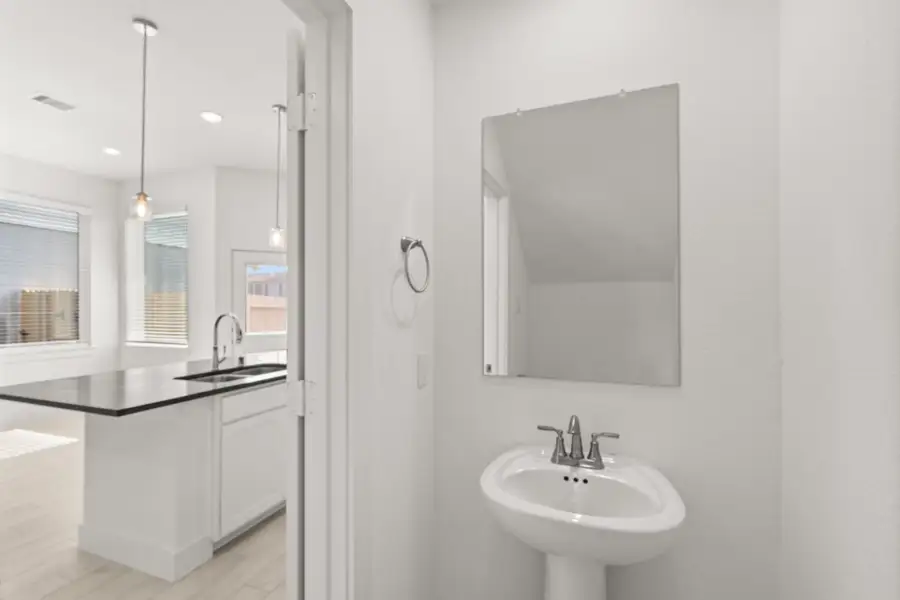 Furnished interior view inside a new home in Meridiana, Manvel (Image 5).