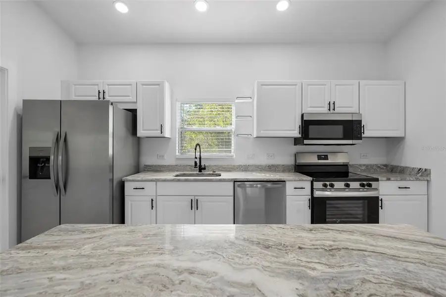 Furnished interior view inside a new home in , Punta Gorda (Image 5).