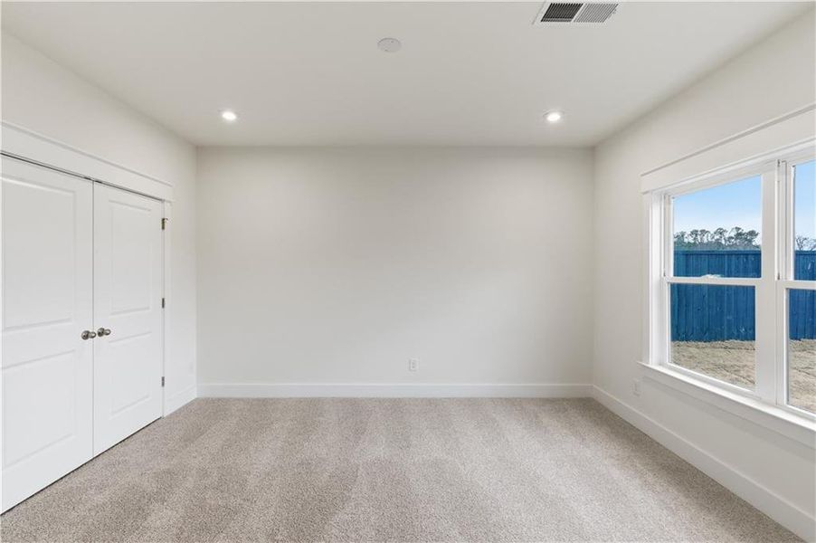 Spacious, unfurnished interior of a new home in Springside Reserve, Powder Springs (Image 22).