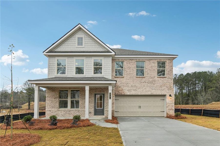 Front exterior of a new home in Hamilton Lakes, Lawrenceville, GA, highlighting curb appeal (Image 2). Front exterior of a new home in Hamilton Lakes, Lawrenceville, GA, highlighting curb appeal (Image 2).