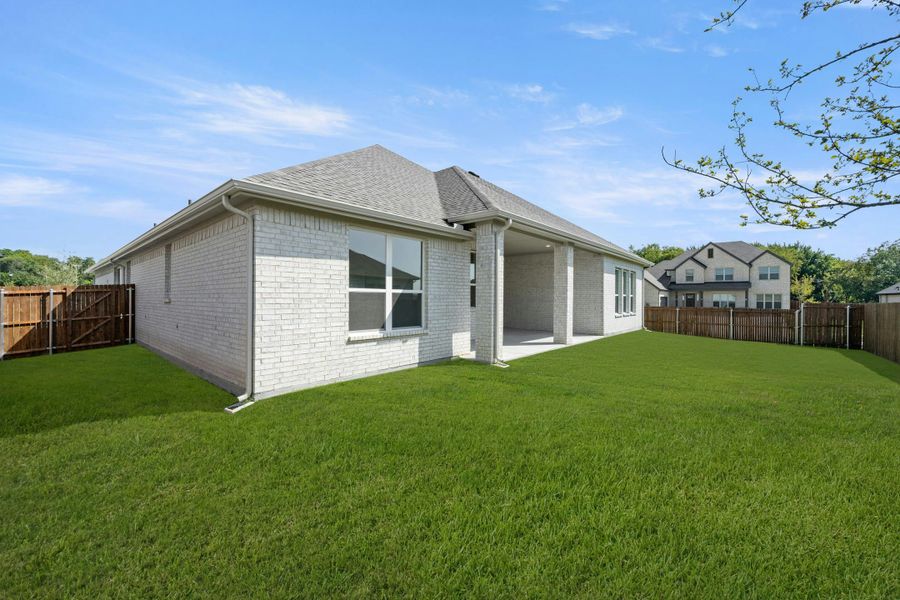 Front exterior of a new home in Kentsdale Farms, DeSoto, TX, highlighting curb appeal (Image 17).