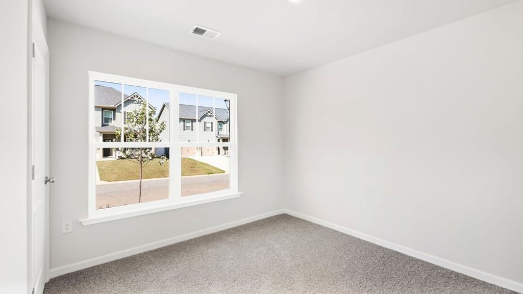 Spacious, unfurnished interior of a new home in Ravencrest, Roebuck (Image 18).