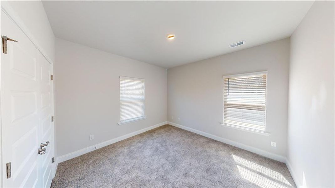 Spacious, unfurnished interior of a new home in Holliday Pass, Griffin (Image 19).