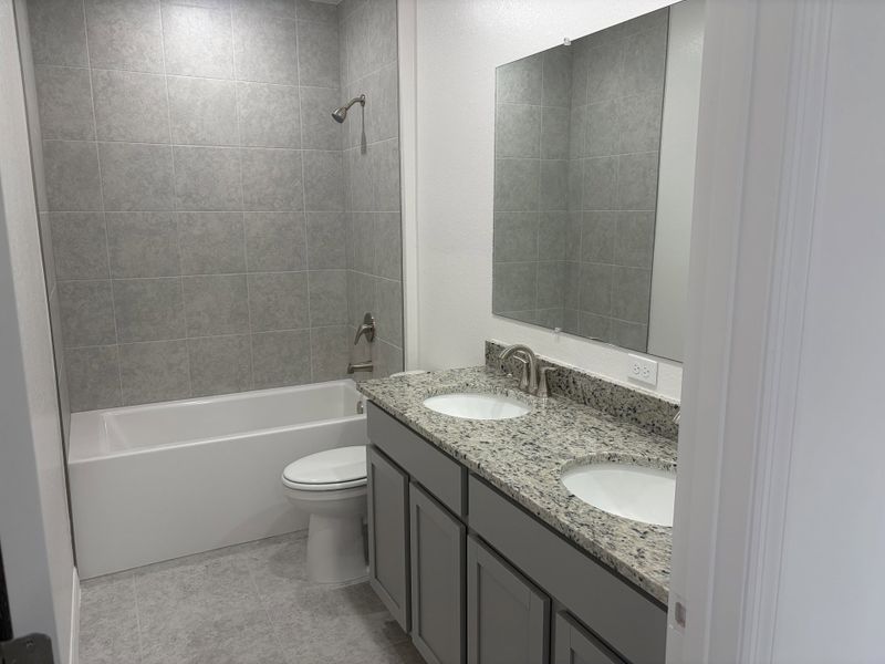 Furnished interior view inside a new home in Burnt Store Village, Punta Gorda (Image 8).