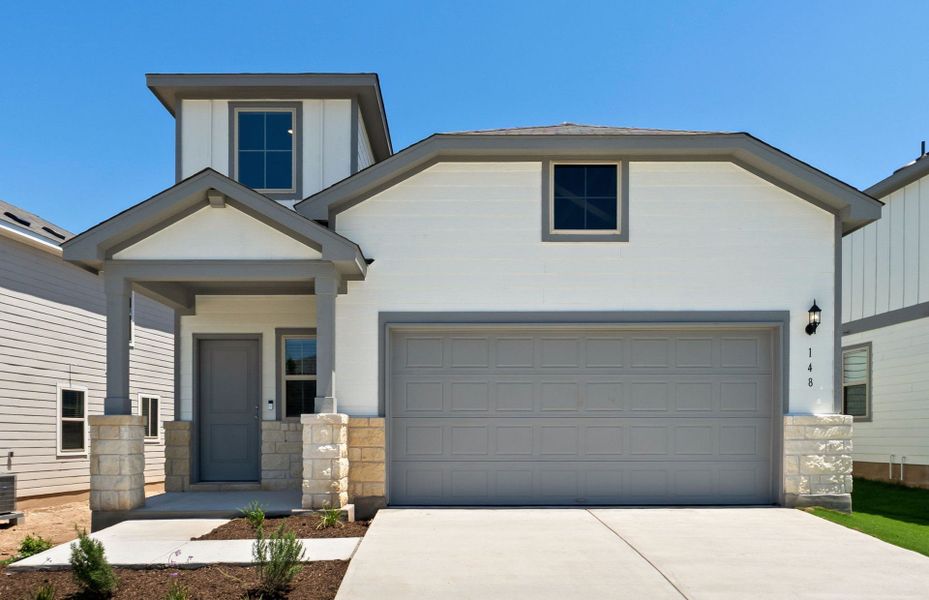 Front exterior of a new home in Sonterra, Jarrell, TX, highlighting curb appeal (Image 19). Front exterior of a new home in Sonterra, Jarrell, TX, highlighting curb appeal (Image 19).