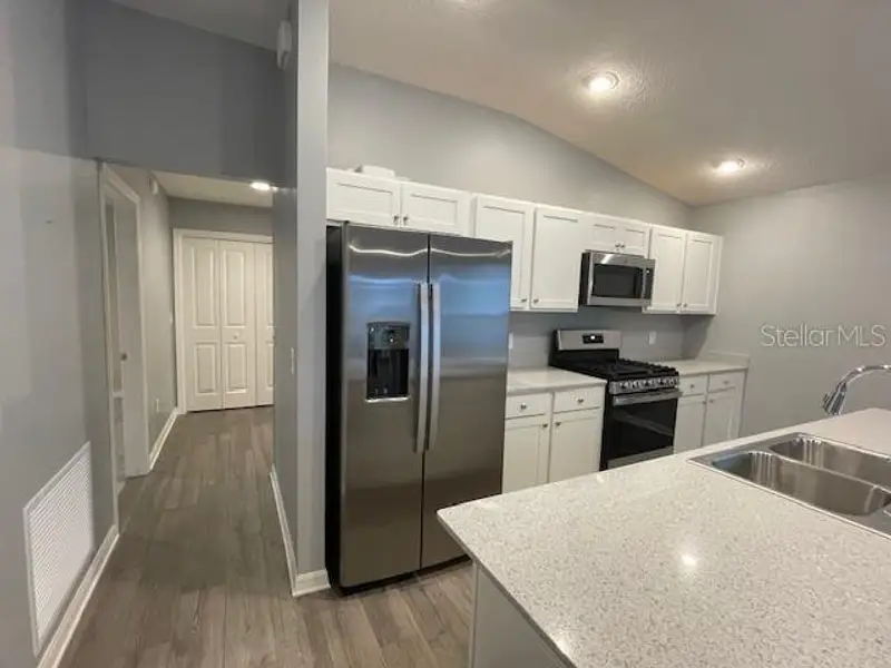 Furnished interior view inside a new home in , The Villages (Image 15).
