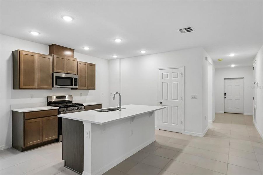 Furnished interior view inside a new home in Eagletail Landings, Howey-in-the-Hills (Image 3).