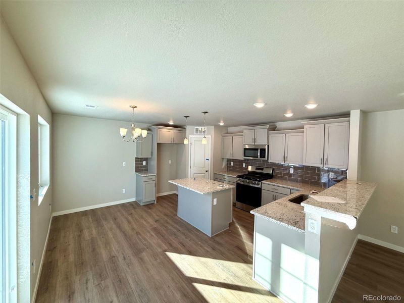 Furnished interior view inside a new home in , Watkins (Image 4). Furnished interior view inside a new home in , Watkins (Image 4).