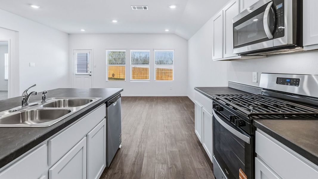 Representative furnished interior of a home built from the The Easton by D.R. Horton in Wayside, Uhland (Image 9).