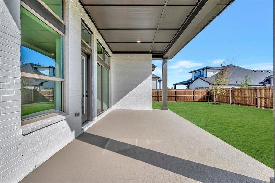 Covered patio with a concrete surface Covered patio with a concrete surface