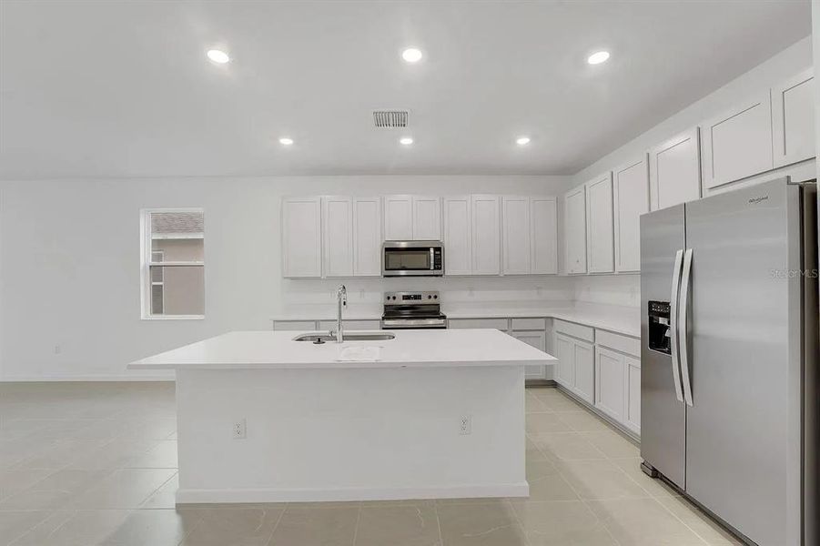 Furnished interior view inside a new home in Cypress Park Estates, Haines City (Image 5).