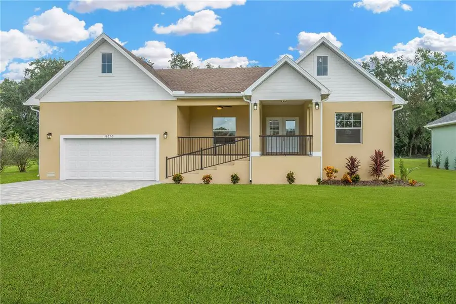 Exterior details and patio area of a home in , Dade City (Image 28).