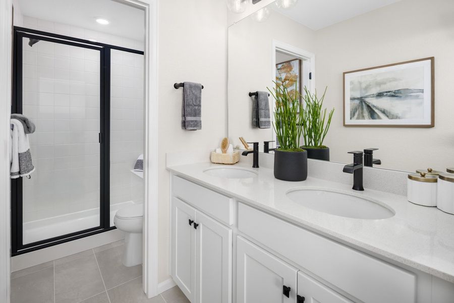 Representative furnished interior of a home built from the 2212 by Risewell Homes in Windler, Aurora (Image 8).