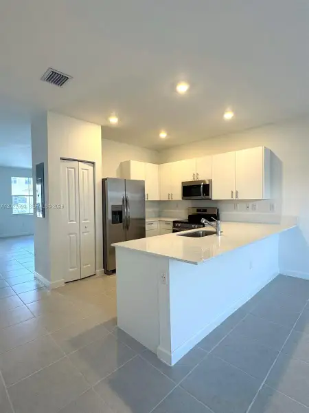 Furnished interior view inside a new home in , Homestead (Image 3).