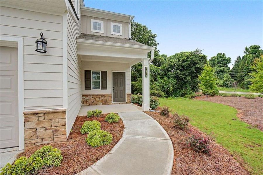 Exterior details and patio area of a home in The Reserve at Chapel Hill Phase II, Douglasville (Image 26). Exterior details and patio area of a home in The Reserve at Chapel Hill Phase II, Douglasville (Image 26).