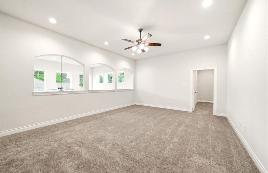 Spacious, unfurnished interior of a new home in The Woodlands Hills 65′, Willis (Image 39).