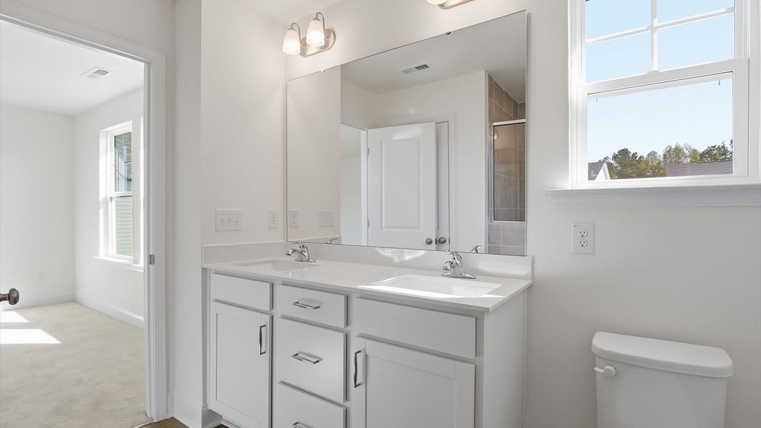 Furnished interior view inside a new home in Sidney Creek Single Family, Zebulon (Image 11).
