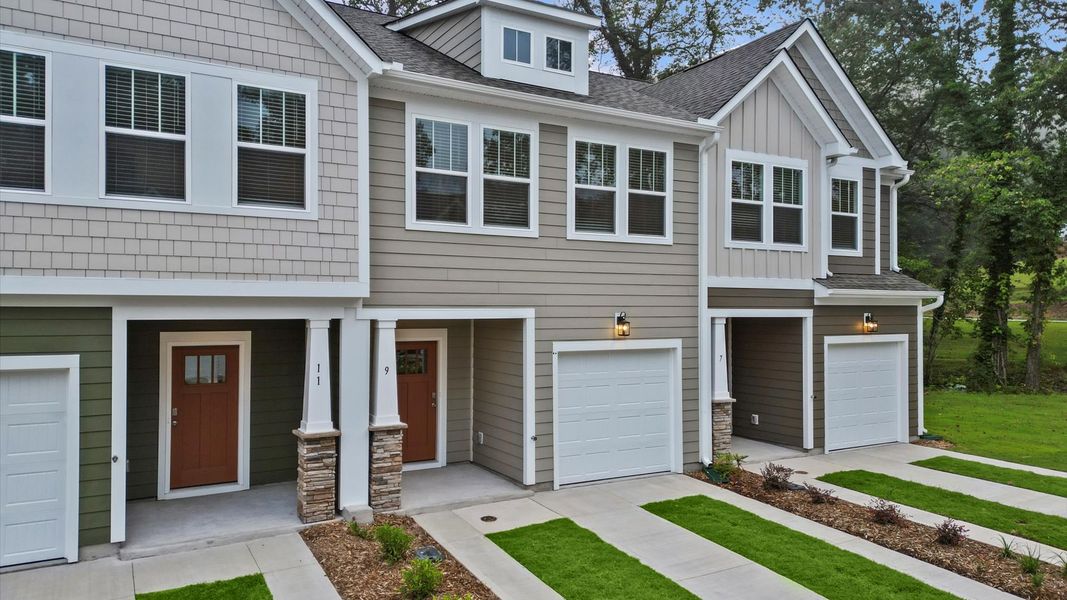 Vibrant home exterior in a thoughtfully planned community near city conveniences Vibrant home exterior in a thoughtfully planned community near city conveniences