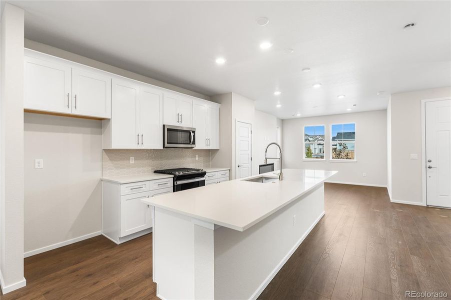 Furnished interior view inside a new home in Painted Prairie, Aurora (Image 8).