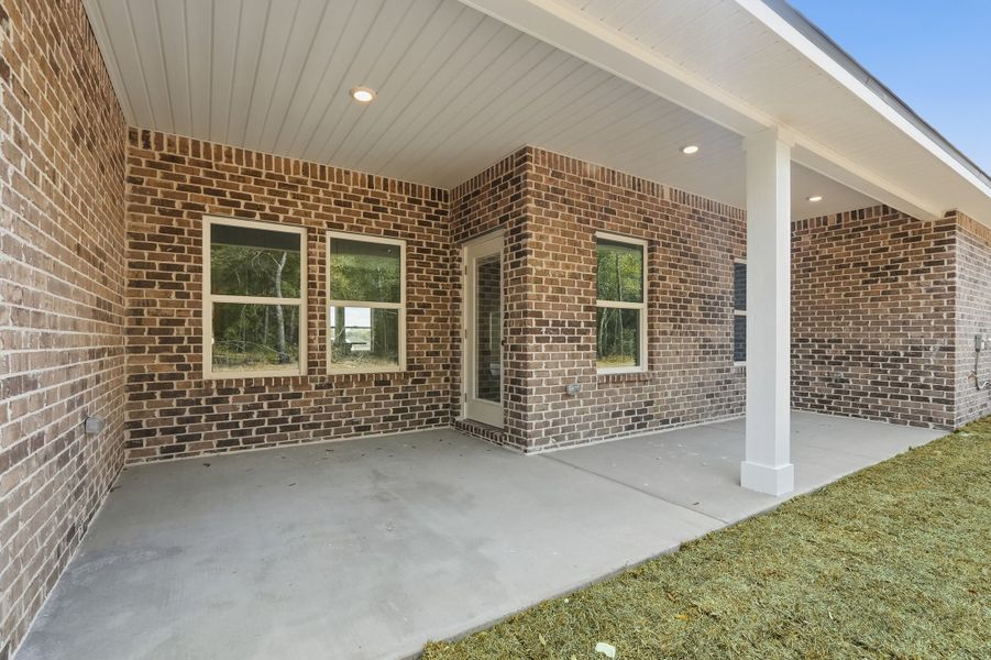 Exterior details and patio area of a home in Southern Charm, Crestview (Image 29).