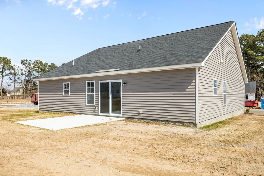 Exterior details and patio area of a home in Davenport Farms, Winterville (Image 23).