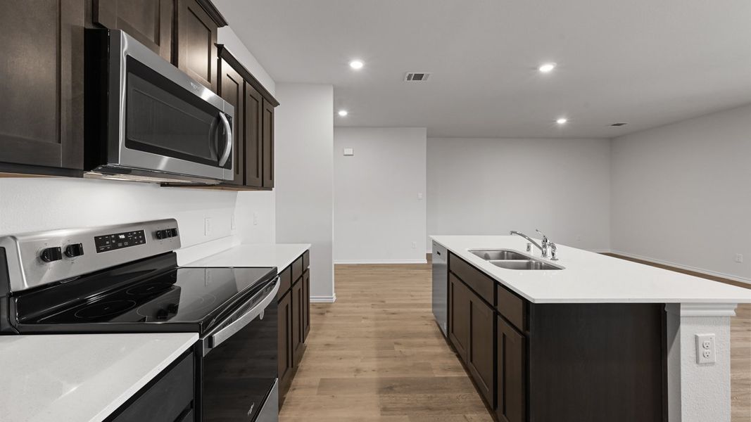 Representative furnished interior of a home built from the Holden by D.R. Horton in Whitewing Trails, Princeton (Image 6).