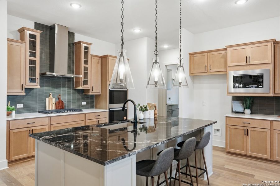 Furnished interior view inside a new home in Kinder Ranch - 70', San Antonio (Image 18).