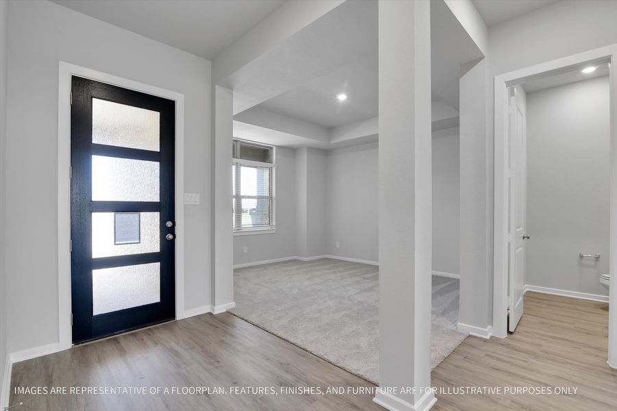 Spacious, unfurnished interior of a new home in Sunterra 50s, Katy (Image 18).