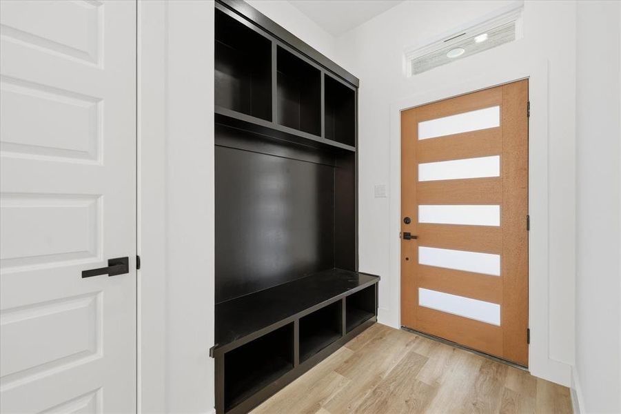 Mudroom featuring light LVP flooring